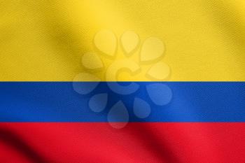 Flag of Colombia waving in the wind with detailed fabric texture. Colombian national flag.