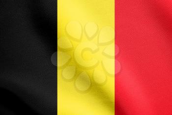 Flag of Belgium waving in the wind with detailed fabric texture. Belgian national flag.