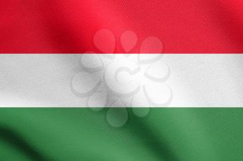 Flag of Hungary waving in the wind with detailed fabric texture. Hungarian national flag.