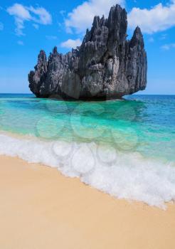 Beautiful tropical landscape. Scenic view of sandy beach, sea and mountain island, Palawan, Philippines, Southeast Asia