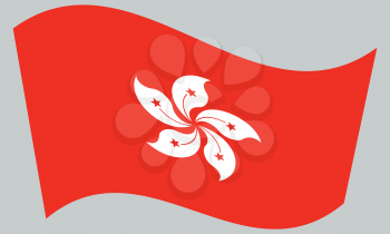 Flag of Hong Kong waving on gray background. The Hong Kong is special administrative region of the Peoples Republic of China.