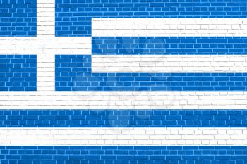 Flag of Greece on brick wall texture background. Greek national flag.