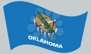 Oklahoman official flag, symbol. American patriotic element. USA banner. United States of America background. Flag of the US state of Oklahoma waving on gray background, vector