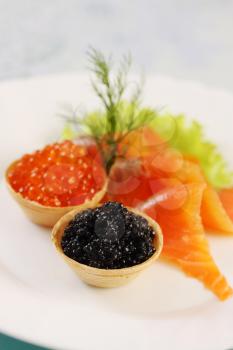 Waffle baskets with caviar and smoked salmon