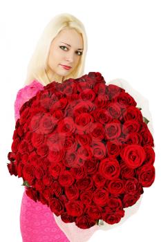 woman is holding a huge bouquet of red roses