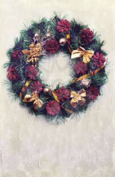 Christmas decorative wreath hanging on the door