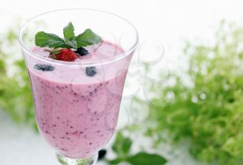 Summer cocktail of mulberry and strawberry yogurt