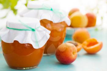 fresh apricots and apricot jam, still life