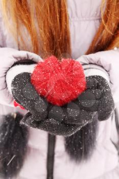  woman holding red Wool heart in hand