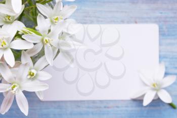 Greeting card and a bouquet of white lilies