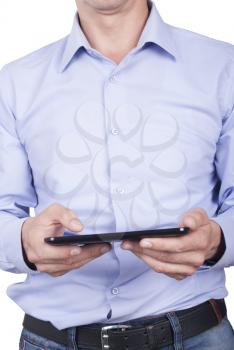 Man with tablet in hands close-up.