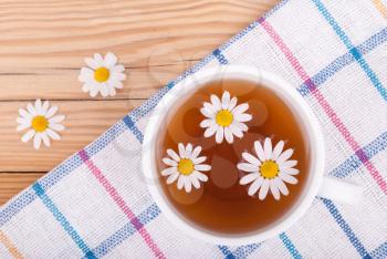 Cup of tea with chamomile.