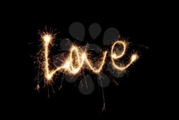 The inscription Love from sparklers