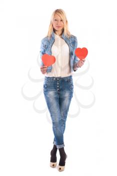 Beautiful girl with paper hearts posing on a white background.