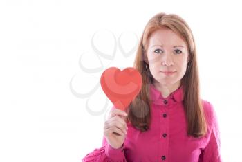 Beautiful girl with paper heart on a white background.