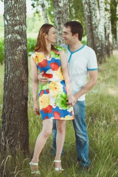 Young couple in love outdoors in the summer.