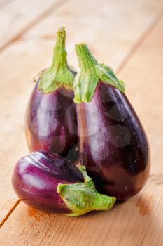 Healthy Organic Vegetables Eggplants On A Wooden Background