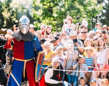MINSK, BELARUS - JULY 19, 2014: Historical restoration of knightly fights on VI festival of medieval culture Our Grunwald, dedicated to 604 anniversary of Battle of Grunwald in Dudutki