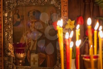 GOMEL - MAY 4: Interior Of Belarusian Orthodox Church. Candles Under The Ancient Icon Framed With The Gold On May 4, 2013 In Gomel, Belarus