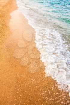 Soft Sea Ocean Waves Wash Over Yellow Sand Background