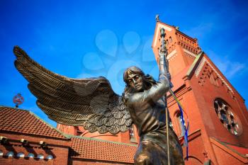 Statue Of Archangel Michael With Outstretched Wings, Thrusting A Spear Into A Dragon Before The Catholic Church Of St. Simon And St. Helena.
the Sculpture Symbolizes The Victory Of The Heavenly Host O