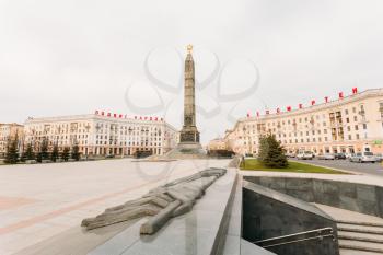 MINSK, BELARUS - APR 6, 2014 Victory Square - Symbol Belarusian Capital
The inscription on the building Exploit people are immortal