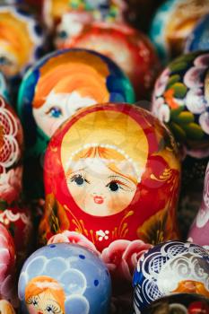 Colorful Russian Nesting Dolls Matreshka At Market. Matrioshka Babushka Nesting Dolls Are Most Popular Souvenirs From Russia.