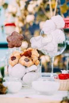 Dessert Sweet Tasty Marshmallow And Cookies In Candy Bar On Table. Delicious Sweet Buffet. Wedding Holiday Decorations