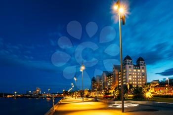 Night view of the city's waterfront, illuminated lanterns in the Oslo city center, Norway