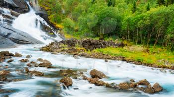 Waterfall In The Valley Of Waterfalls In Norway. Panoramic View