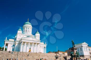 Helsinki Cathedral, Helsinki, Finland. The Facade Fronted By A Statue Of Emperor Alexander II Of Russia. Travel landmark