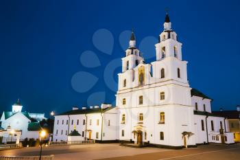 The Cathedral Of Holy Spirit In Minsk - Main Orthodox Church Of Belarus And Symbol Of Capital. Evening, Night Scene With White Illuminated Building On Background Of Blue Sky