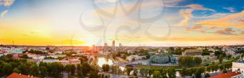 Sunset Or Sunrise Over Cityscape Of Vilnius, Lithuania In Summer Season. Beautiful Panoramic View In Evening. Dramatic Colorful Sky. Travel Panorama