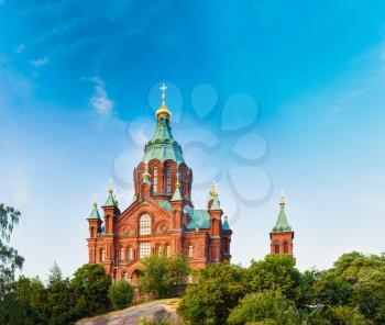 Helsinki, Finland. Uspenski Cathedral On Hill At Summer Sunny Day. Red Church - Tourist Destination In Finnish Capital. Eastern Orthodox Cathedral Dedicated To Dormition Of The Theotokos (Virgin Mary)