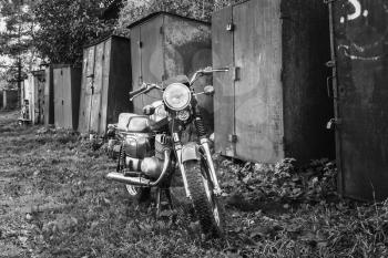 Old Red Motor Cycle Parked On Yard. Vintage Generic Motorcycle Motorbike In Countryside