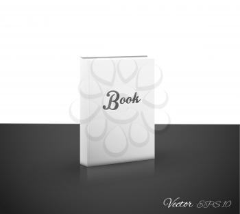 White book on white and black