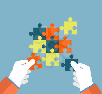 Person making a puzzle. A hand puts proper puzzle. Businessman assembling jigsaw puzzle. Business concept