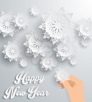 Snowflakes background for winter and New Year, christmas theme. Snow, christmas, snowflake background, snowflake winter. 3D paper snowflakes. Happy New Year 2016. Silver snowflake. Snowflakes and hand