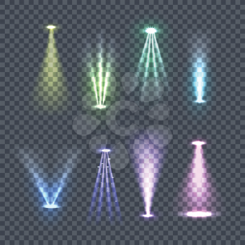Set of spotlights rays. Vector illustration on transparent background. Yellow, green, blue, violet glowing upper and lower lights. Concert lighting, party, nightclub, advertising and city lights