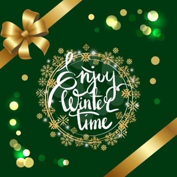 Enjoy winter time inscription in frame made of golden and silver snowflakes vector on green with glittering sparkles, decorated by ribbon and bow in corners