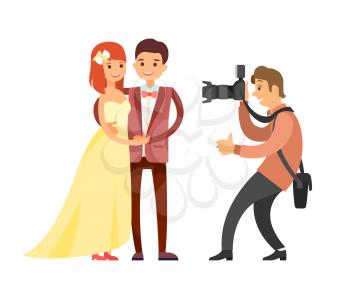 Wedding photo session of newlyweds by photographer. Groom in suit and bride with perfect hair style. Cameraman take pictures of just married couple