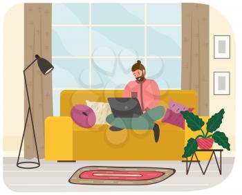 Distance learning, freelance and internet entertainment. Man sitting with laptop on sofa at home. Remote work, online freelancing, internet surfing concept. Interior design of room for work