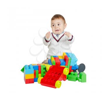 angry boy with colorful plastic toys isolated on white