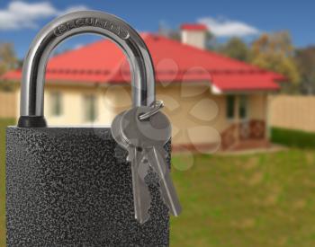 Padlock with house on background, protection of housing concept