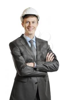 Portrait of an engineer in a suit and crash helmet