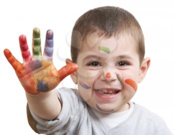  happy little boy with paints on hands isolated on white background
