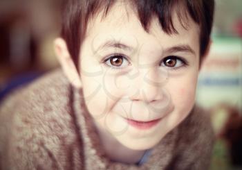 portrait of a happy and beautiful boy closeup