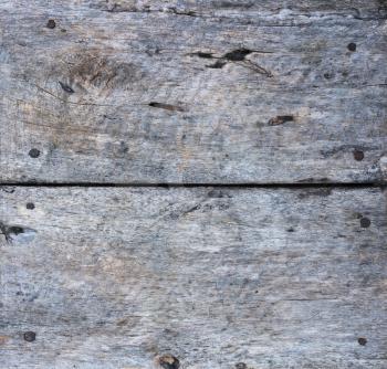 background of old wooden planks cracked