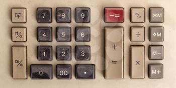 Old calculator for doing office related work, covered in dust