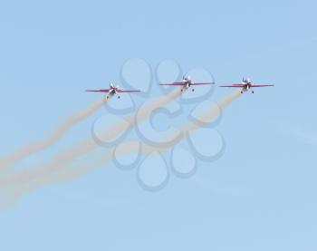 LEEUWARDEN,FRIESLAND,HOLLAND-SEPTEMBER 17: Royal Jordanian Falcons Display Team in their Extra 300L aircraft at the Airshow on September 17, 2011 at Leeuwarden Airfield